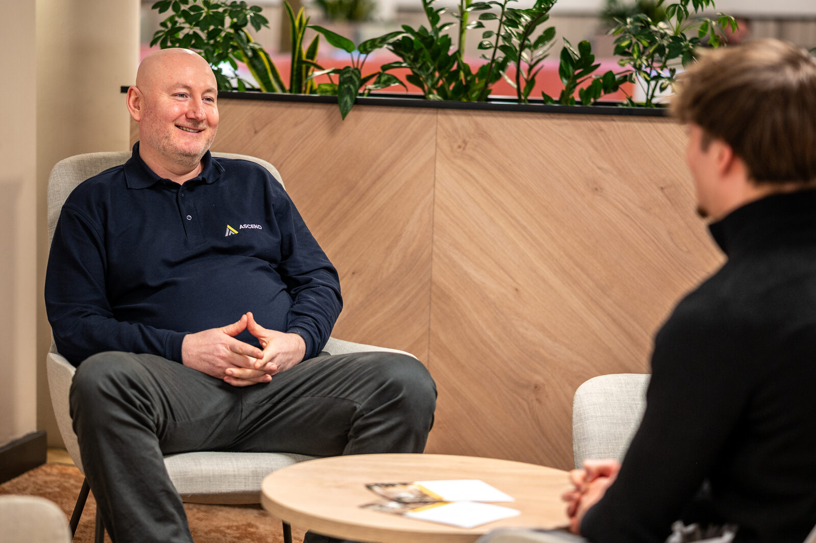 James Wooton in conversation with a client