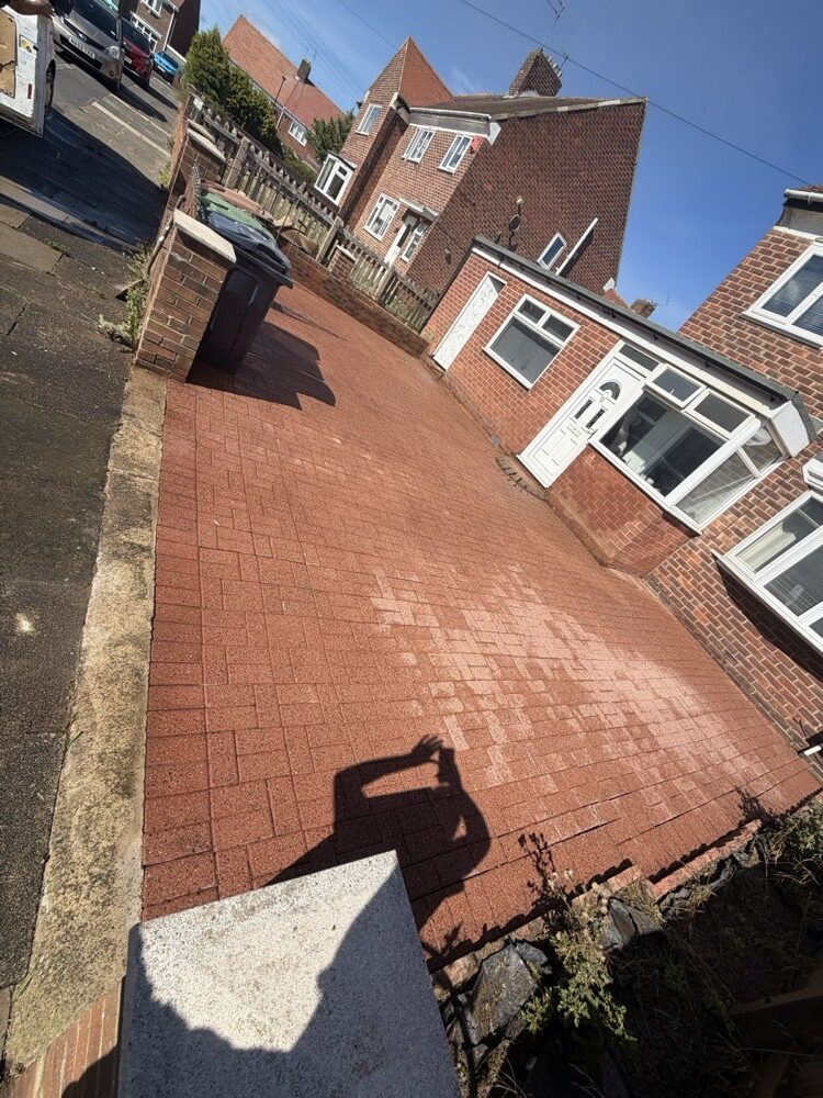 Cleaned red block paving