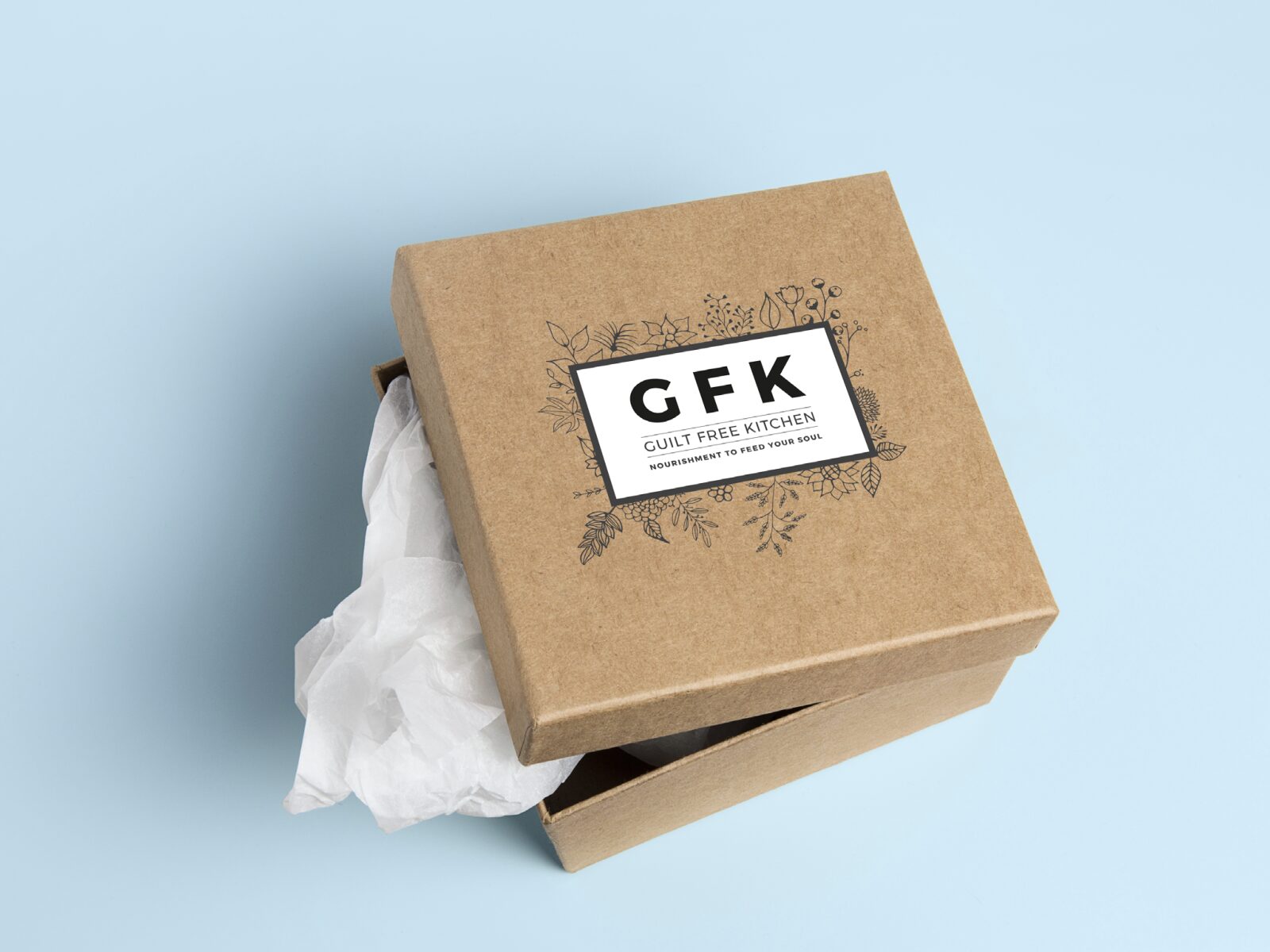 GFK monogram concept on a kraft gift box