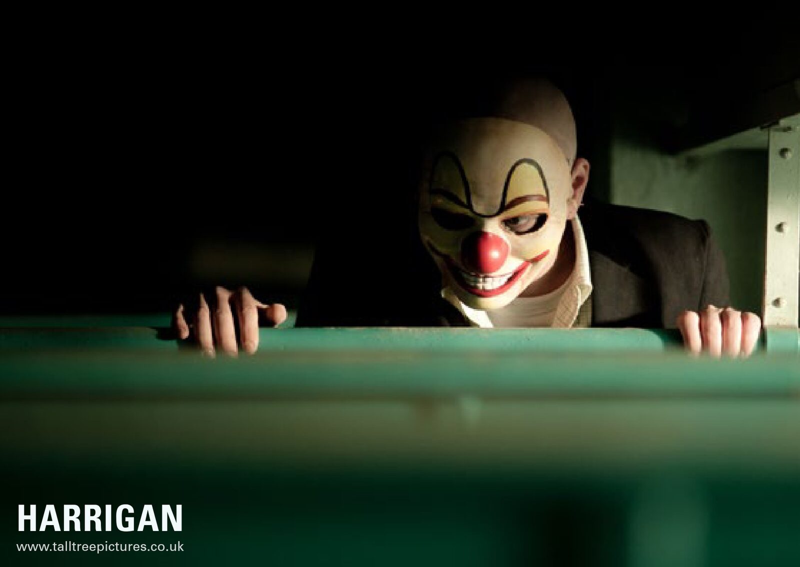 Harrigan postcard, clown mask still