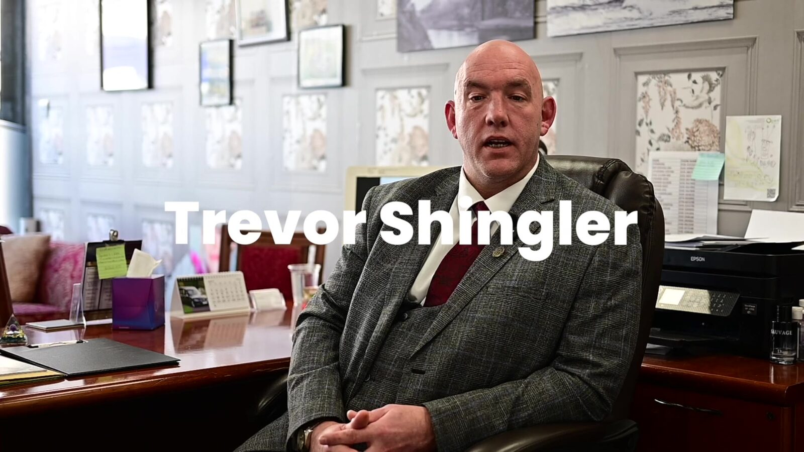 Business owner interviewed in his office