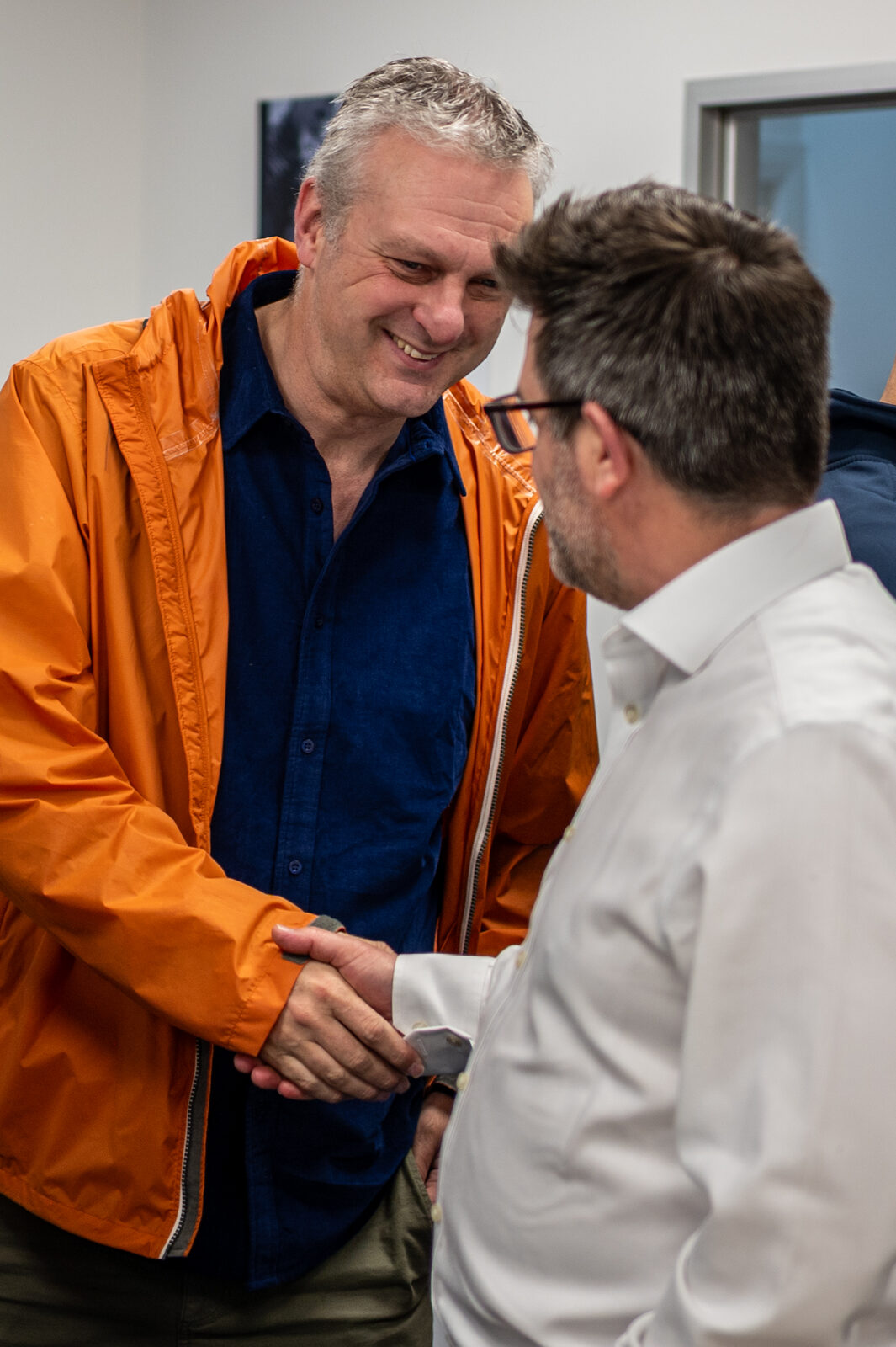 Handshake at a Northern Spire networking breakfast