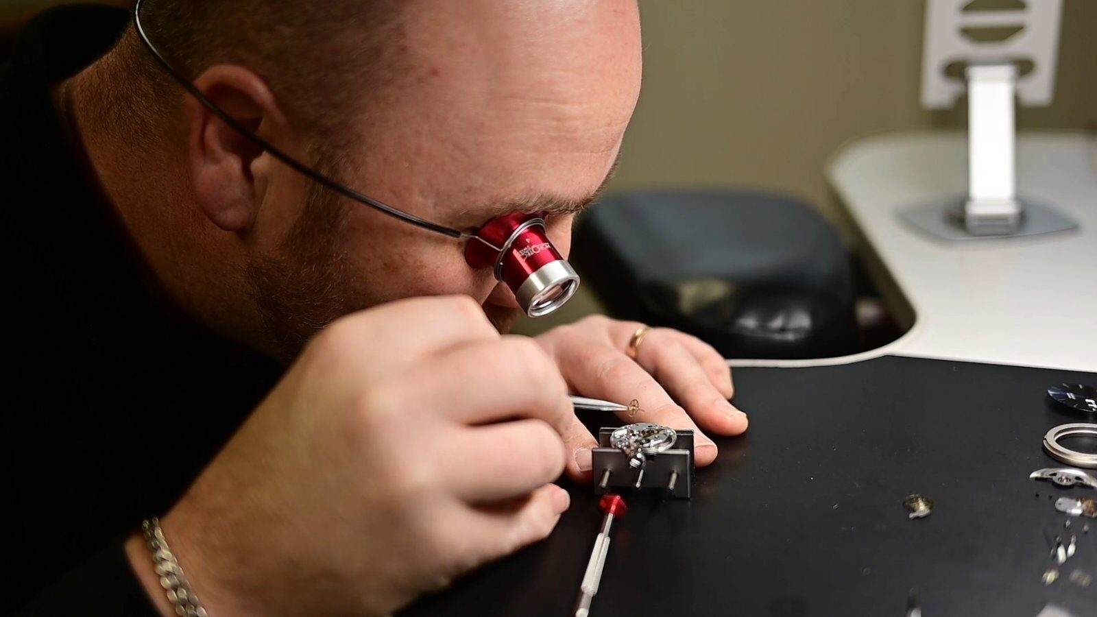 Richard Rigg working under a loupe