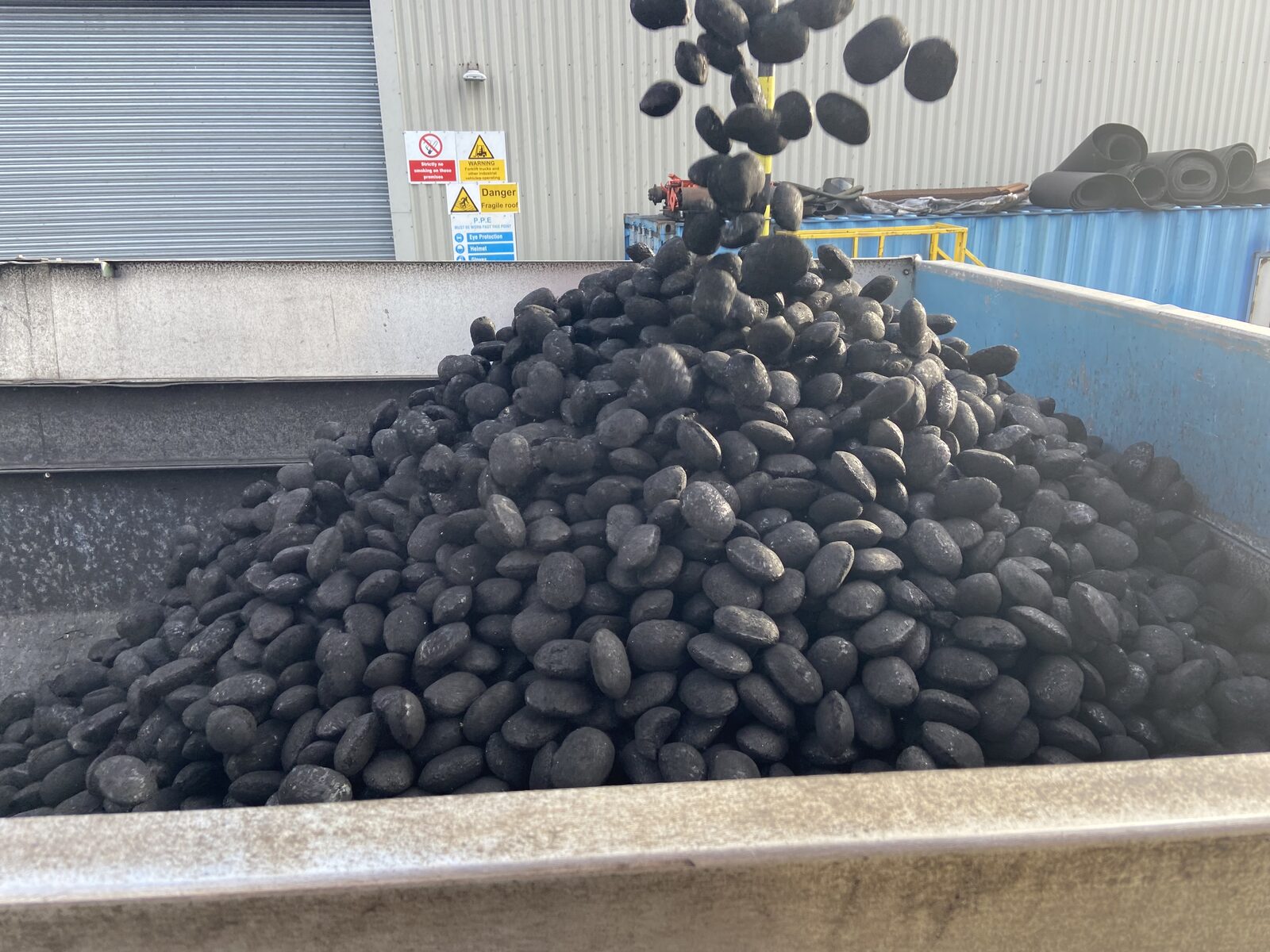 Briquettes being loaded at the yard
