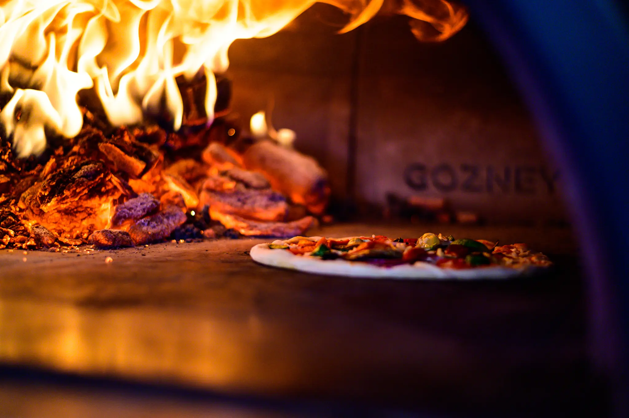 Cheese melting on pizza